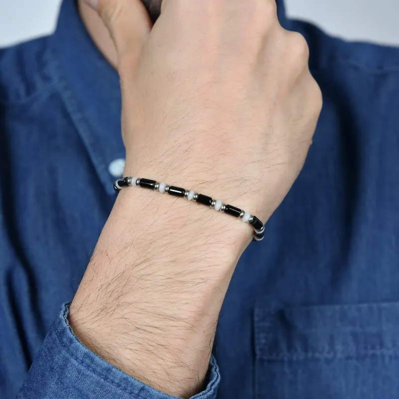 BRACCIALE UOMO IN ACCIAIO CON PIETRE NERE E BIANCHE