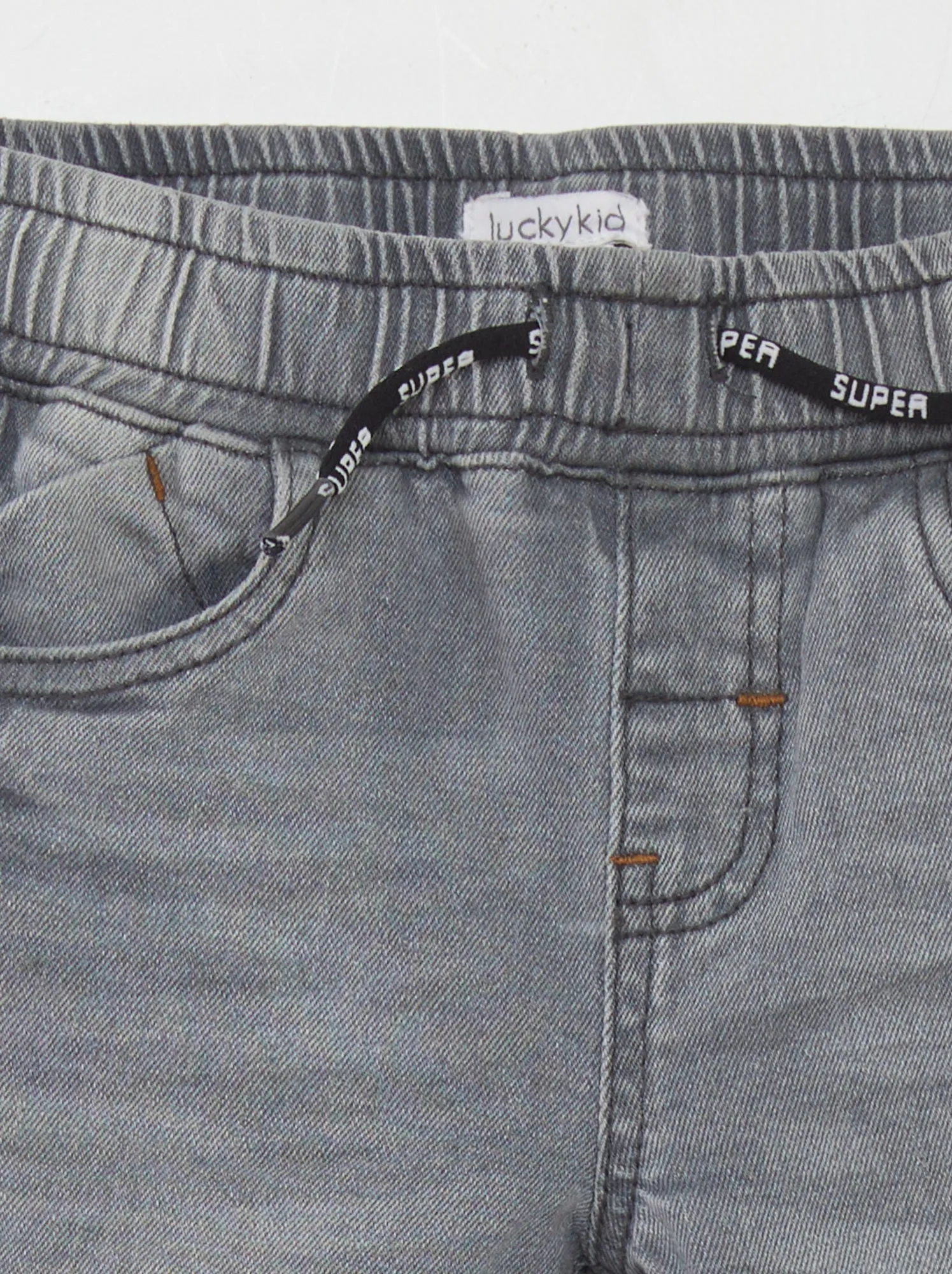 Jeans con vita elasticizzata e cordoncini - GRIGIO
