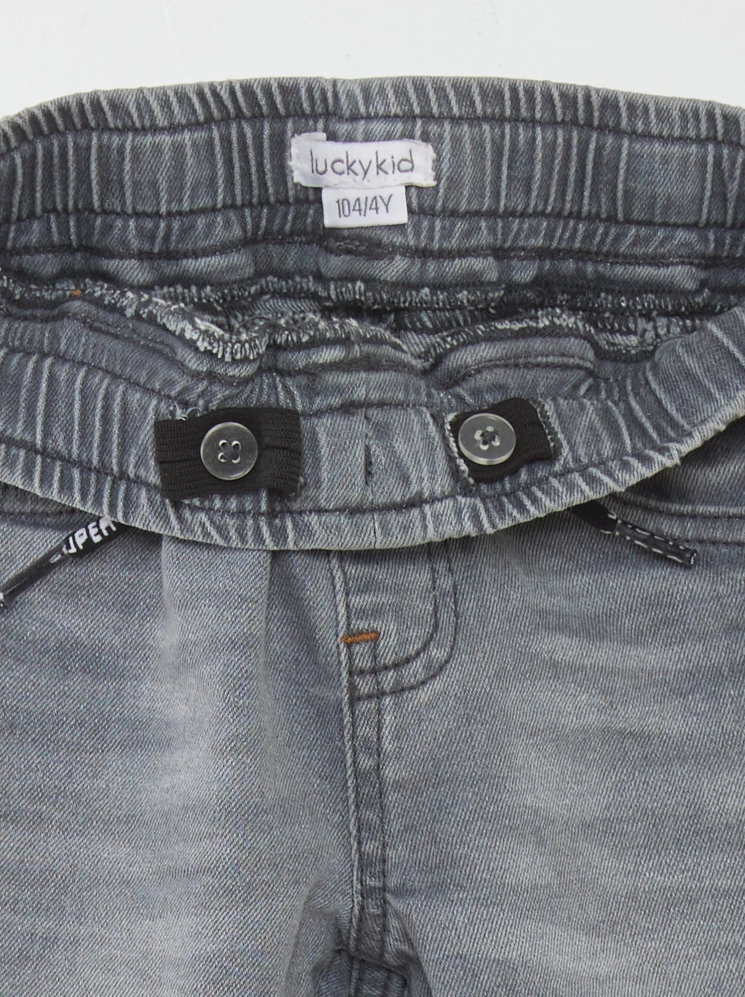Jeans con vita elasticizzata e cordoncini - GRIGIO