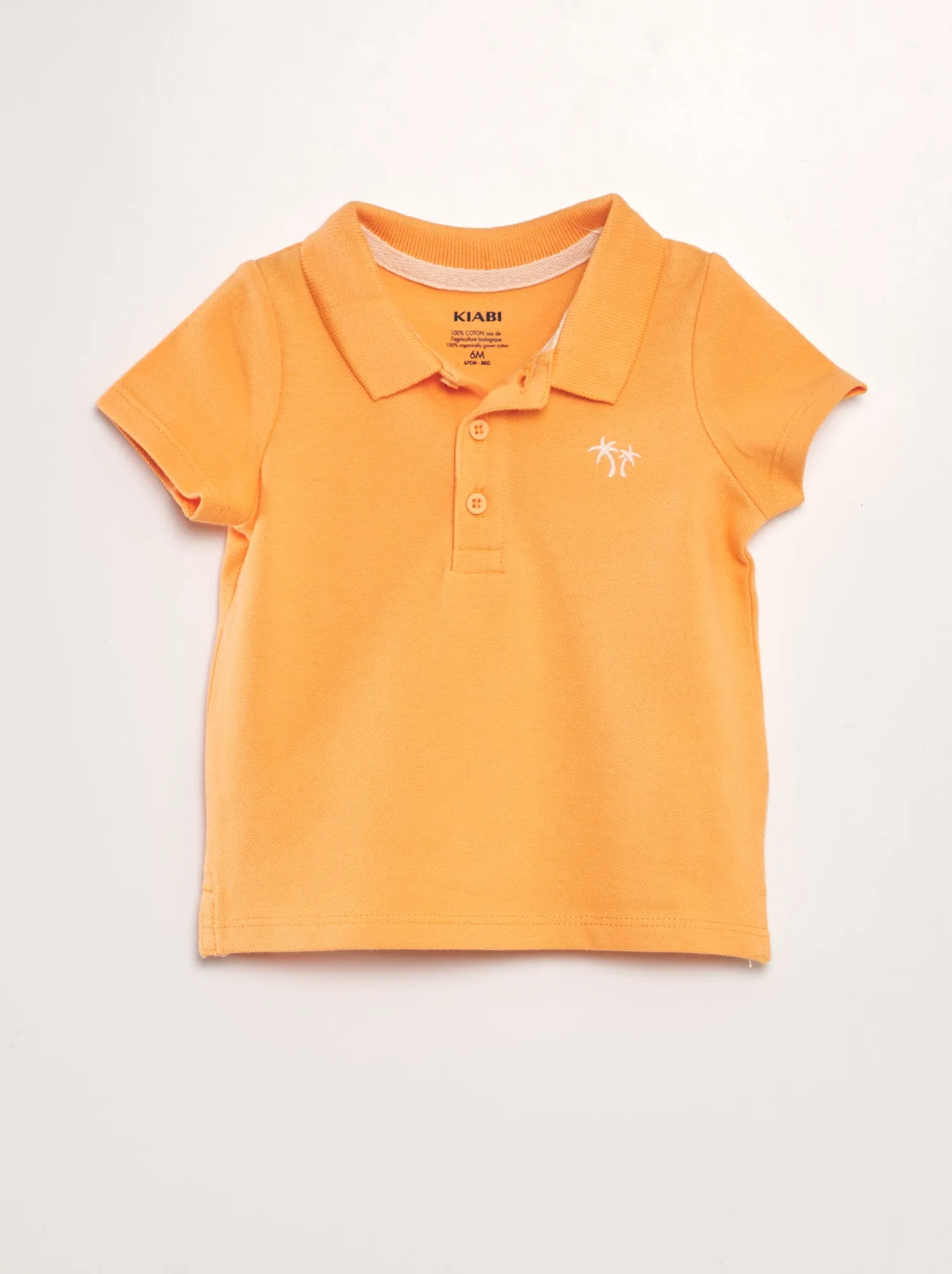 Polo in piqué di cotone 'palme' - ARANCIONE