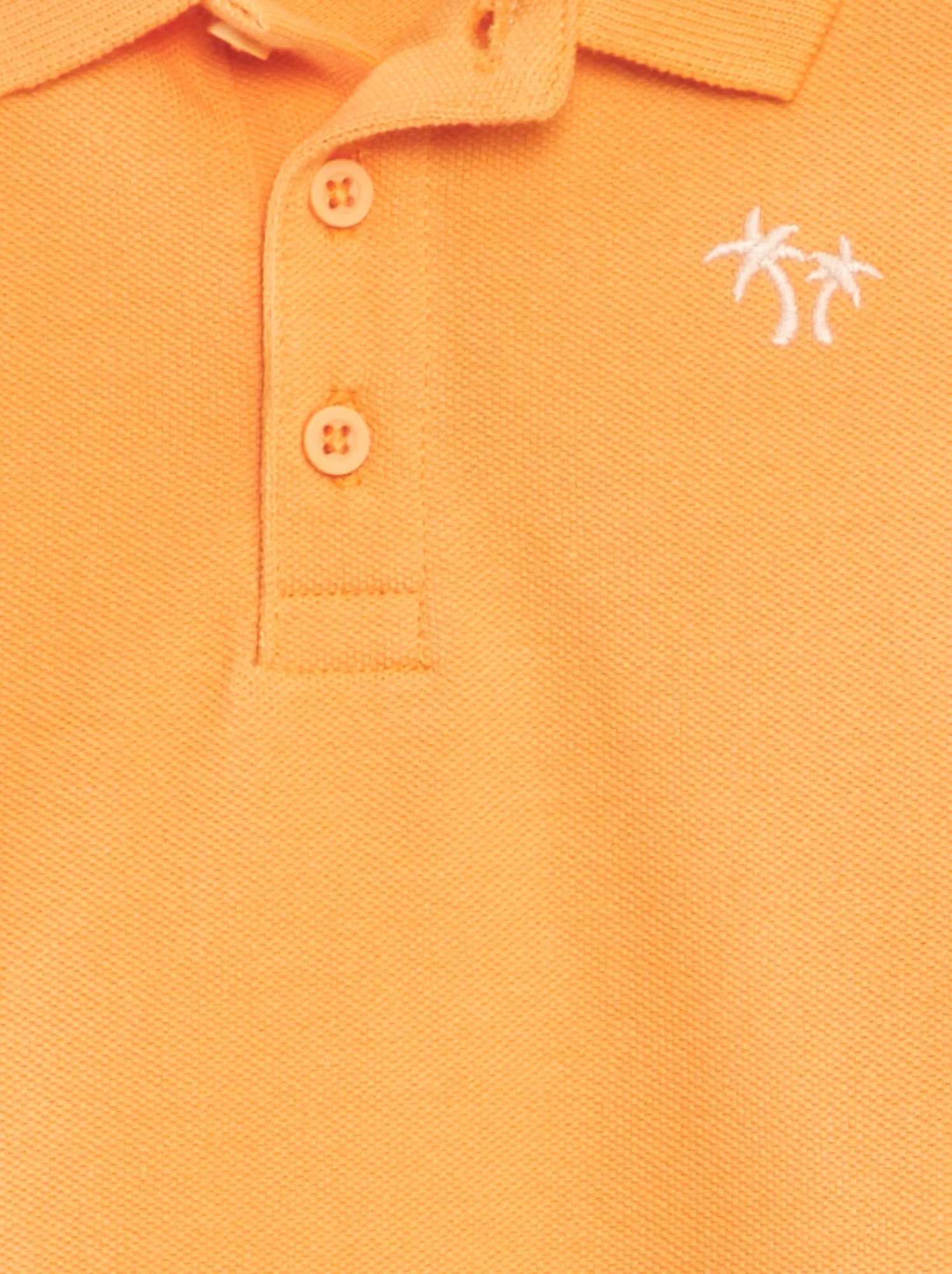 Polo in piqué di cotone 'palme' - ARANCIONE