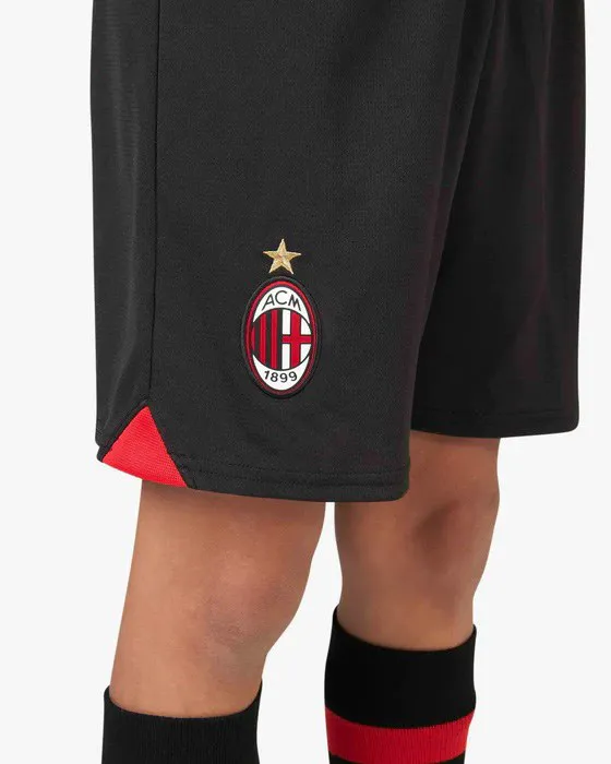 PUMA - Pantaloncini da calcio bambino neri e rossi in tessuto traspirante con logo Milan                                        