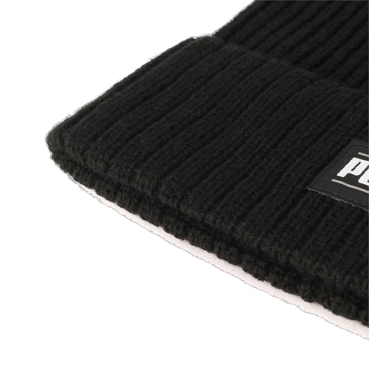 Puma ribbed beanie hat with petch logo 024038-01 black. One size